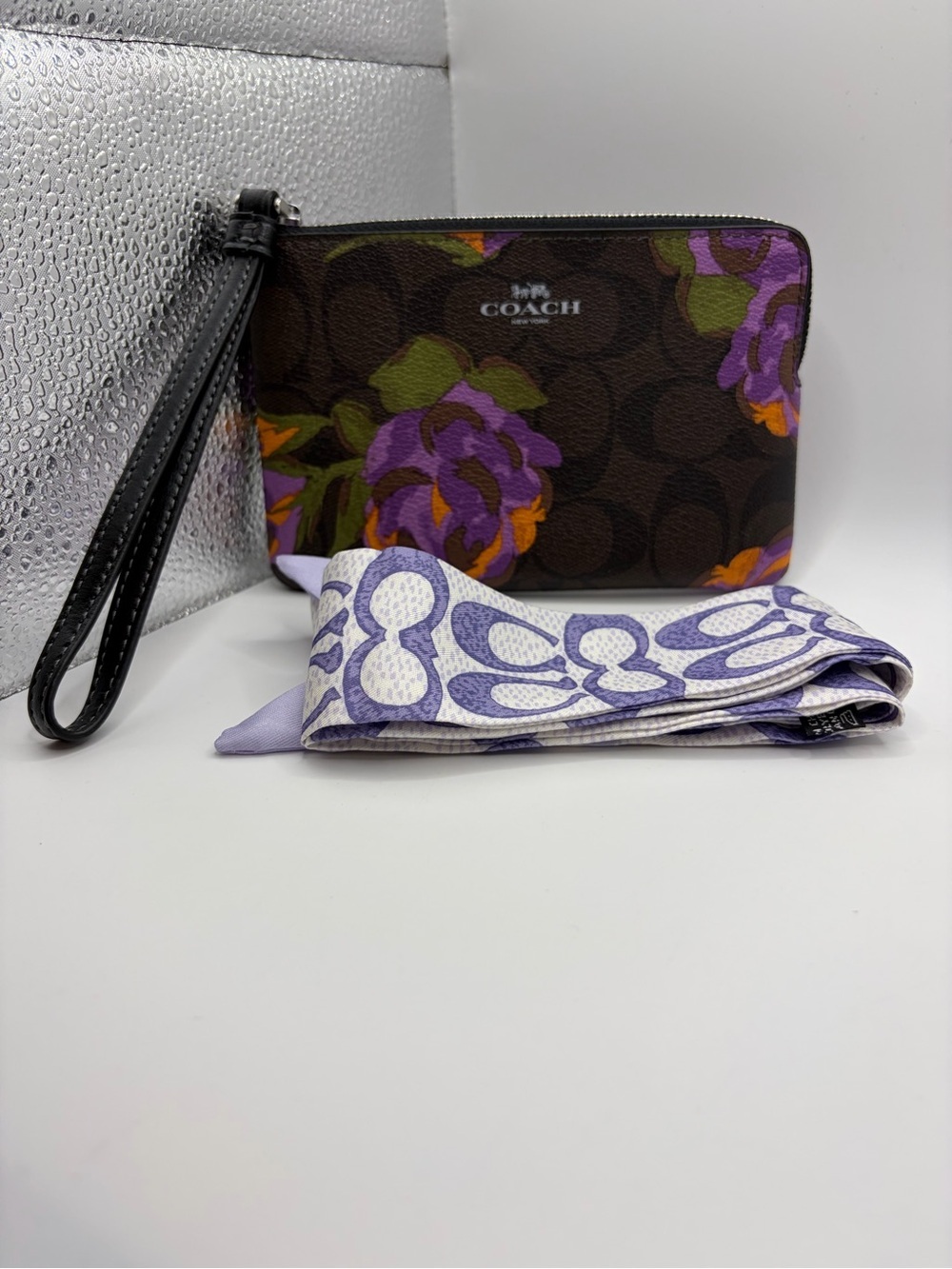 COACH Brown Signature Floral Wristlet with Purple and Orange Accents with coach